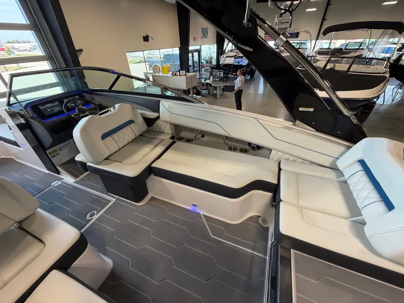 Slide: The Image of Interior of a 2022 Regal LS4 Surf boat with luxurious seating. - 12