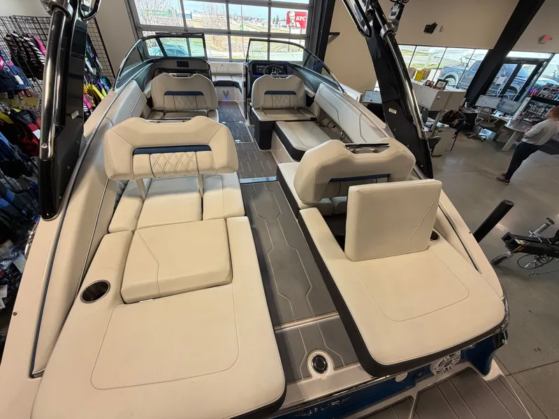 Slide: The Image of Interior view of 2022 Regal LS4 Surf boat with luxurious seating. - 14