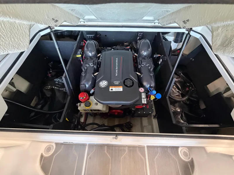 Slide: The Image of Engine compartment of 2022 Regal LS4 Surf with open hatch. - 15