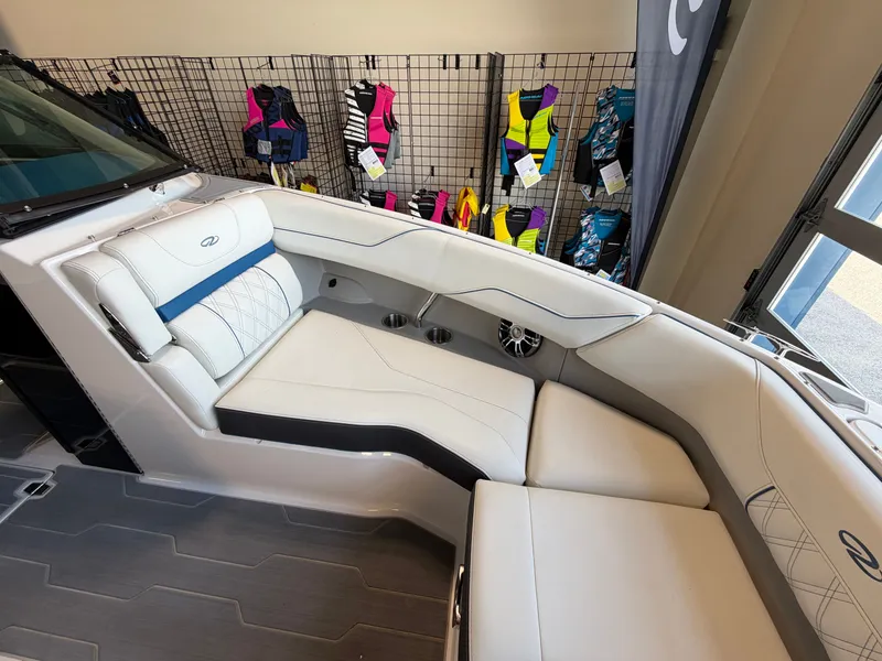 Slide: The Image of Interior of 2022 Regal LS4 Surf with luxurious white seating. - 5