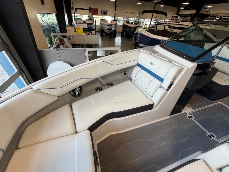 Slide: The Image of Interior view of a 2022 Regal LS4 Surf boat in showroom. - 6