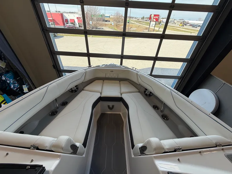 Slide: The Image of Interior view of 2022 Regal LS4 Surf boat with white seating. - 7