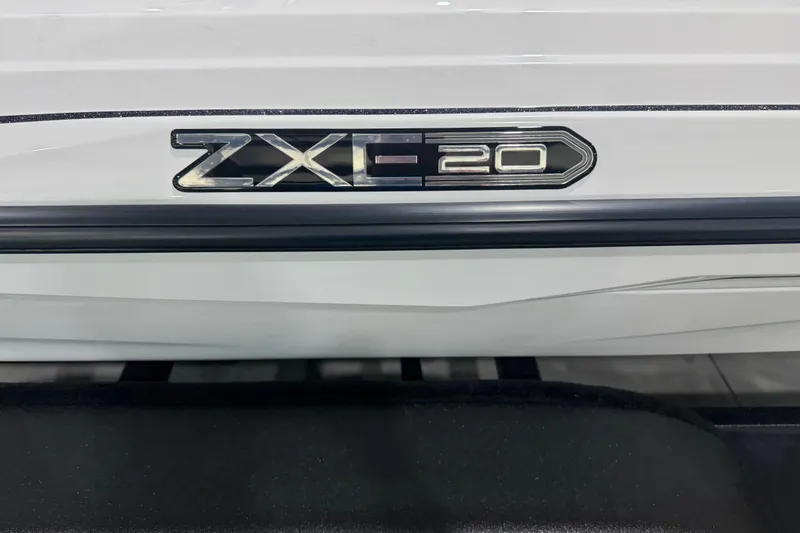 Slide: The Image of 2026 Skeeter ZXE20 logo on a sleek white surface. - 2