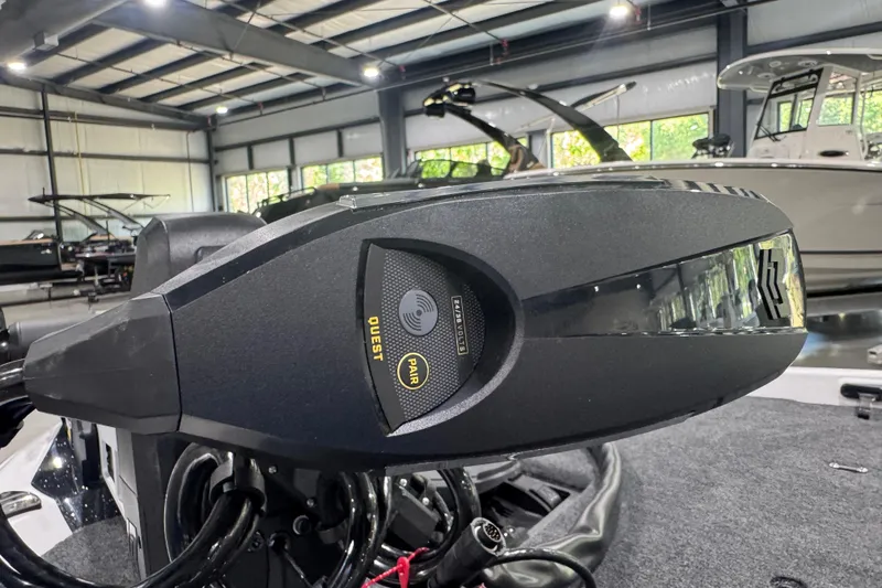 Slide: The Image of 2026 Skeeter ZXE20 boat motor in showroom, featuring advanced technology and sleek design. - 5