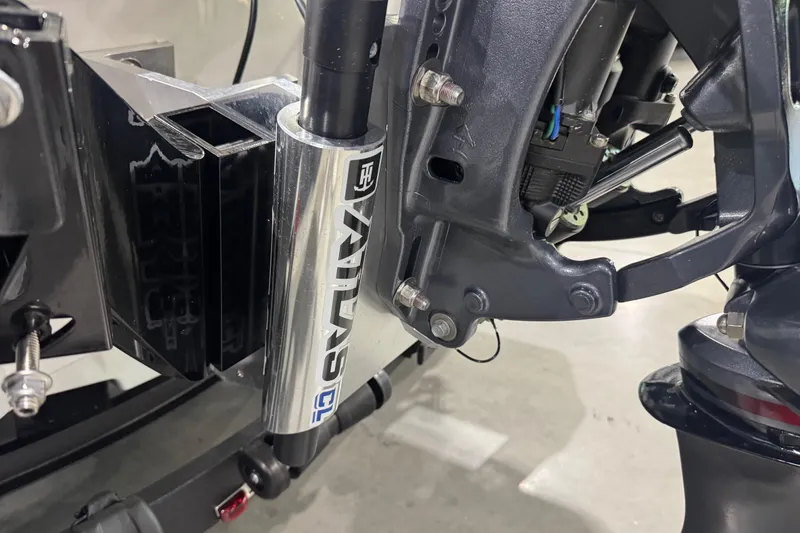 Slide: The Image of Close-up of 2026 Skeeter ZXE20 boat motor mount with Atlas hydraulic jack plate. - 7