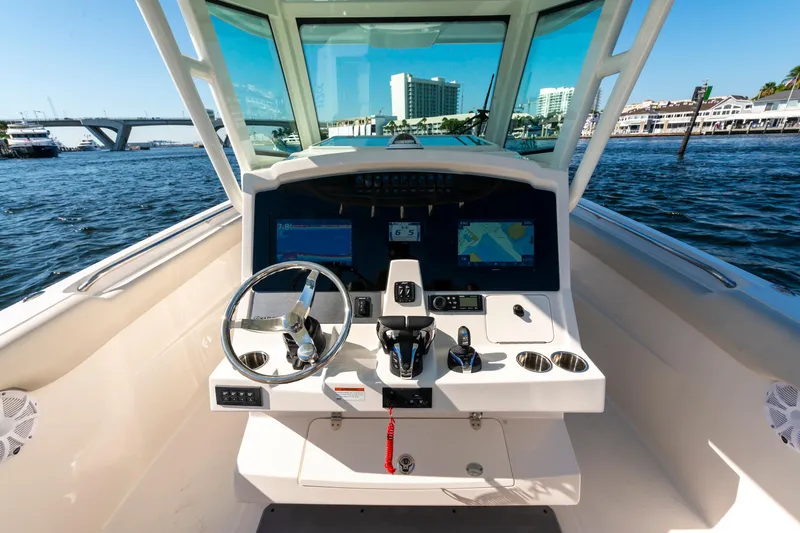 Slide: The Image of Cockpit view of 2027 Sailfish 312 CC boat with modern navigation system. - 7