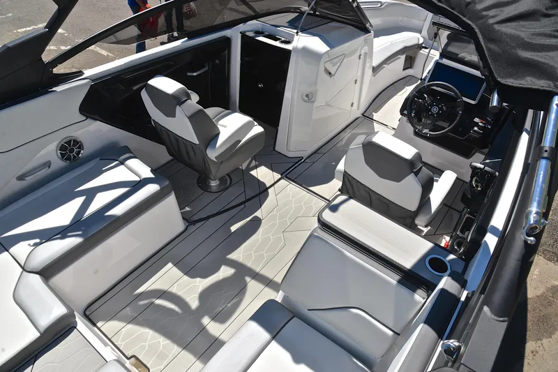 Slide: The Image of 2024 Yamaha Boats 252XE interior with modern seating and sleek design. - 19