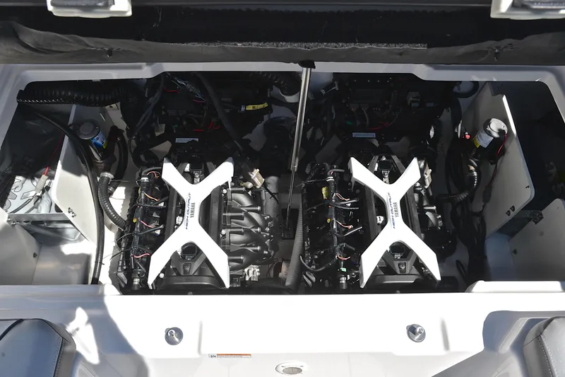 Slide: The Image of 2024 Yamaha Boats 252XE engine compartment showcasing dual engines and components. - 28