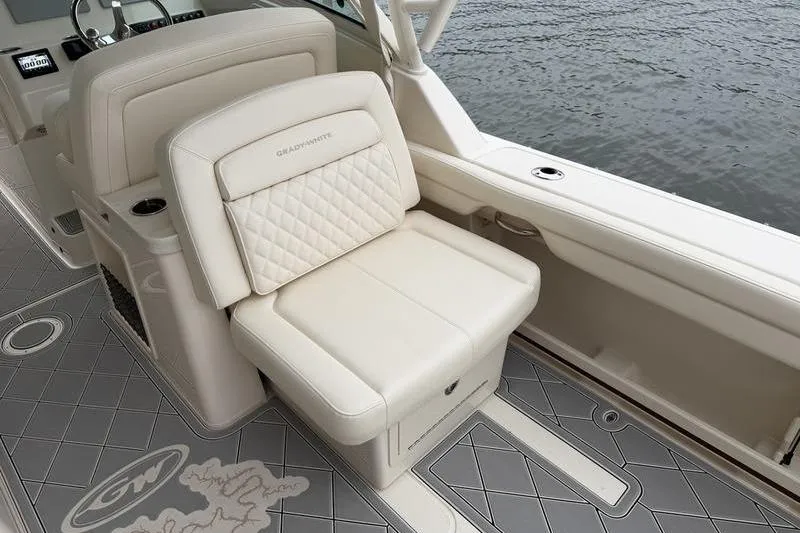 Slide: The Image of Luxury seating on 2025 Grady-White Freedom 325 boat, featuring elegant design and comfort. - 13