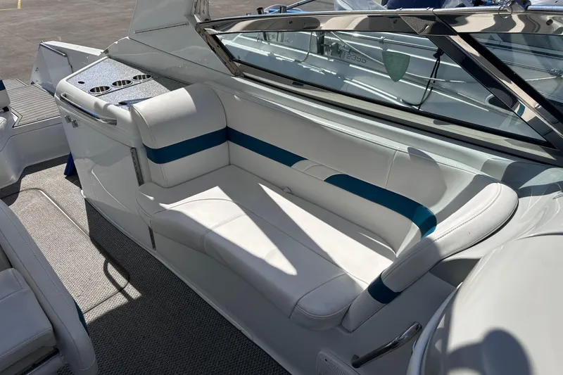 Slide: The Image of 2006 Formula 280 Bowrider interior with white seating and blue accents. - 13