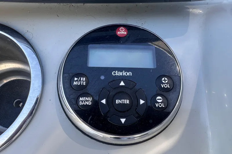 Slide: The Image of Clarion audio control panel on 2006 Formula 280 Bowrider boat dashboard. - 16