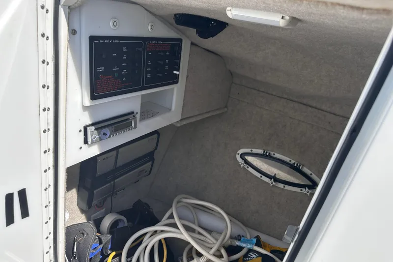 Slide: The Image of Interior cabin of a 2006 Formula 280 Bowrider with control panels and storage. - 20