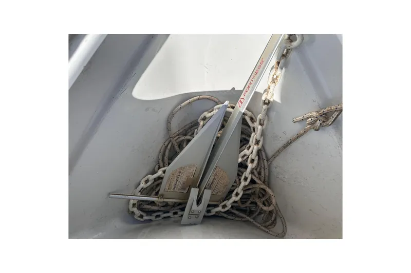 Slide: The Image of Anchor and chain in a 2006 Formula 280 Bowrider boat compartment. - 26