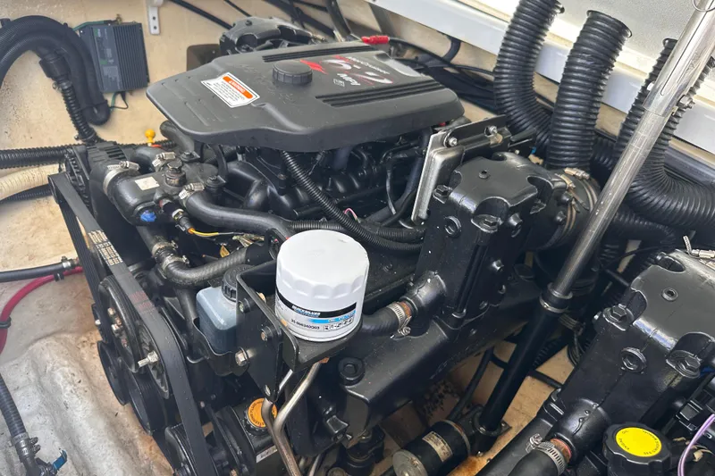 Slide: The Image of Engine compartment of a 2006 Formula 280 Bowrider boat, showcasing detailed components. - 29