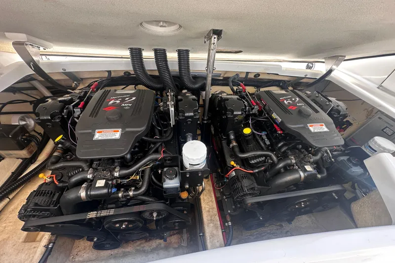 Slide: The Image of Twin MerCruiser engines in a 2006 Formula 280 Bowrider boat engine compartment. - 30