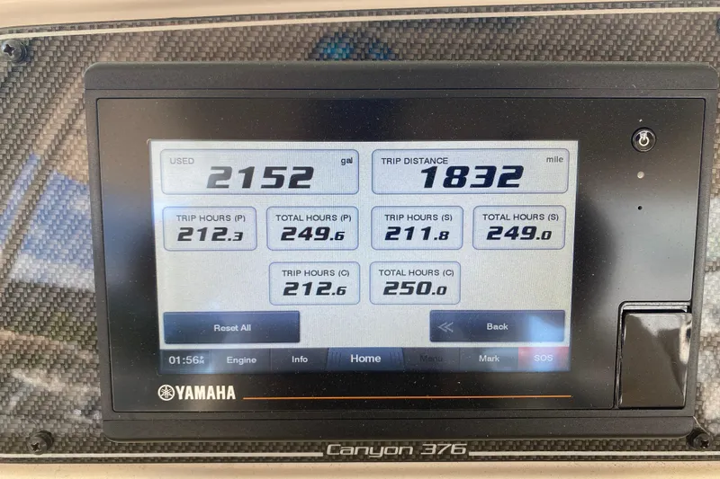 Slide: The Image of Yamaha display on 2021 Grady-White Canyon 376 showing fuel and trip data. - 16