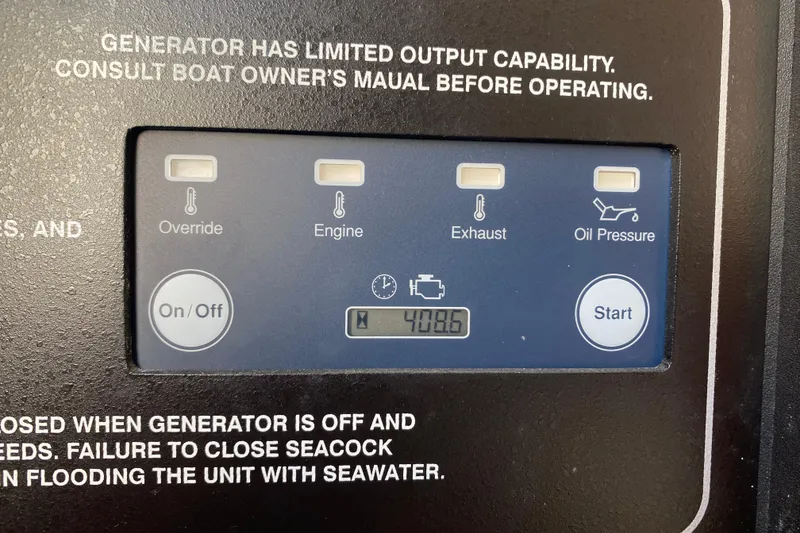 Slide: The Image of Control panel of a 2021 Grady-White Canyon 376 boat generator. - 8