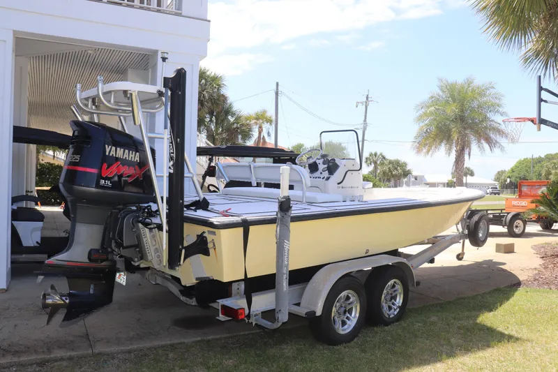 Slide: The Image of 2001 Maverick 21 Master Angler boat with Yamaha VMAX engine on trailer. - 2