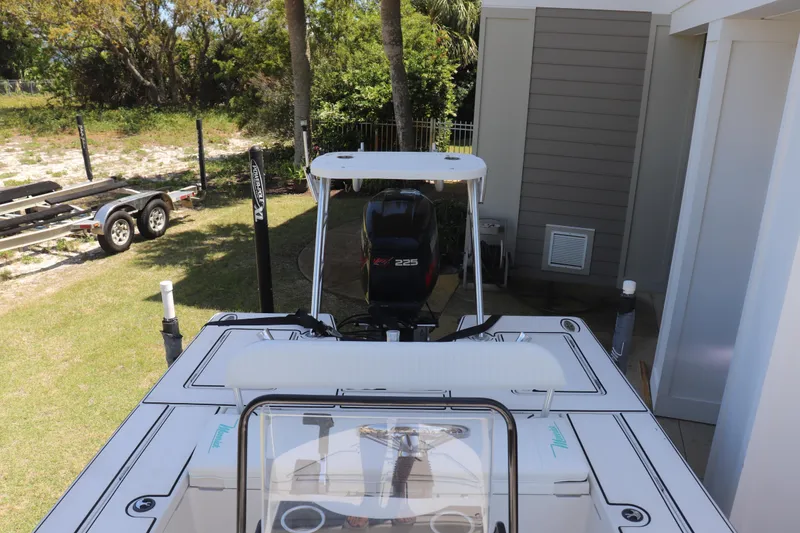 Slide: The Image of 2001 Maverick 21 Master Angler boat with Yamaha 225 engine, parked outdoors. - 7