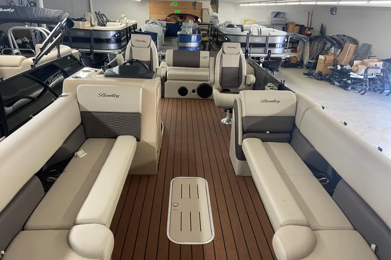 Slide: The Image of Interior of 2026 Bentley Pontoons 25 Elite Swingback with luxurious seating. - 5