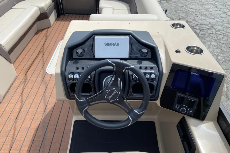 Slide: The Image of Interior view of Bentley Pontoons 25 Elite Swingback 2026 helm. - 6