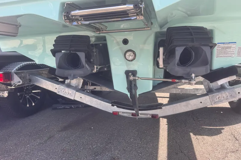 Slide: The Image of Rear view of 2026 Yamaha Boats 222 FSH Sport E on trailer, showcasing dual jet nozzles. - 3