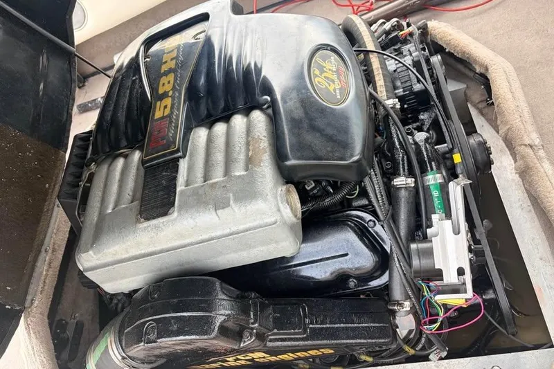 Slide: The Image of Engine of a 2001 Nautique Sport Nautique 200 boat, showcasing detailed components. - 10