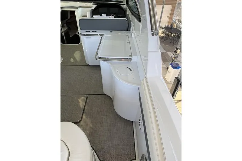 Slide: The Image of Interior view of 2016 Cobalt A40 boat, featuring sleek seating and modern design elements. - 10