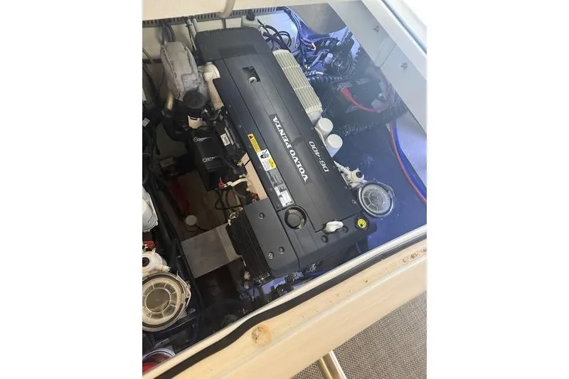 Slide: The Image of Engine compartment of a 2016 Cobalt A40 boat featuring a Volvo Penta engine. - 23