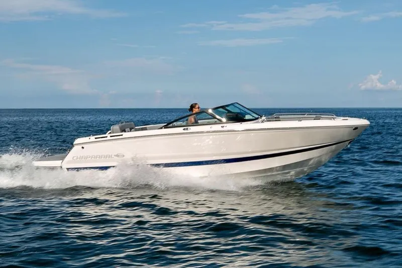 Slide: The Image of Manufacturer Provided Image: 2026 Chaparral SSX 4 speedboat cruising on open water under clear skies. - 3