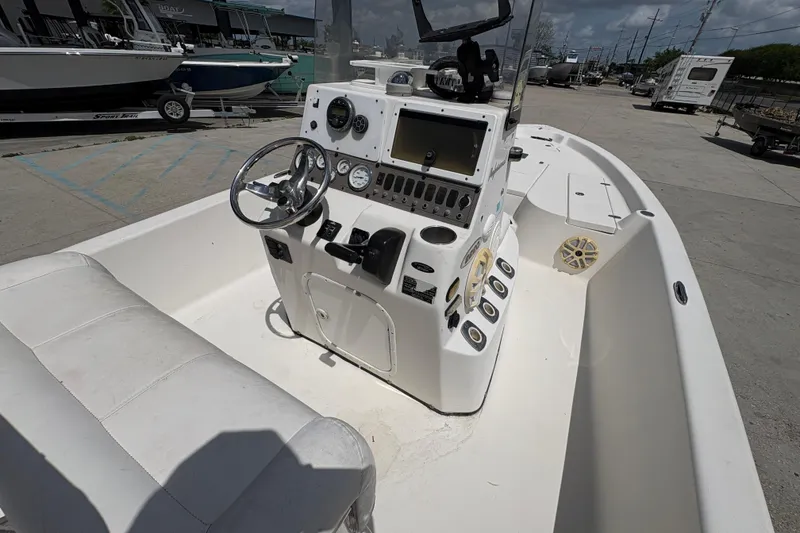 Slide: The Image of 2005 Blazer Bay 2220 Professional boat interior with steering console and seating. - 16