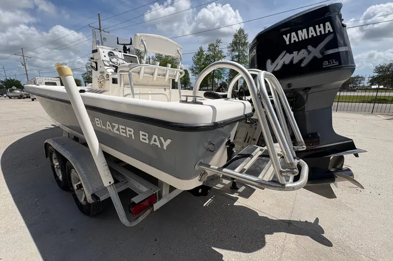 Slide: The Image of 2005 Blazer Bay 2220 Professional boat with Yamaha VMAX engine on trailer. - 6