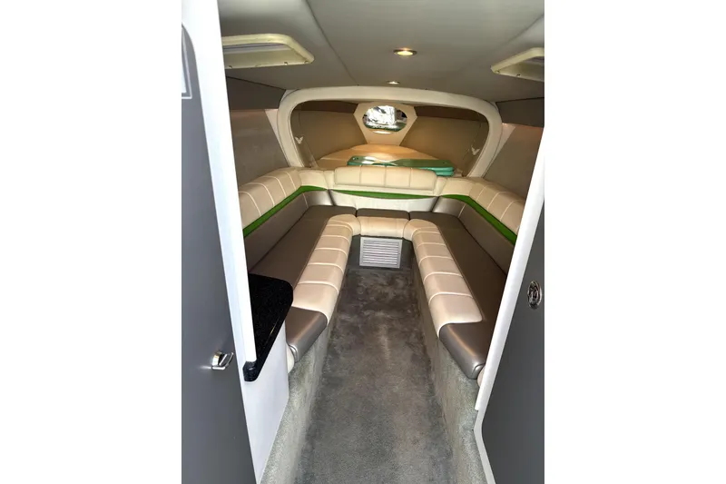 Slide: The Image of 2008 Formula 353 FASTech cabin interior with beige and green seating. - 18