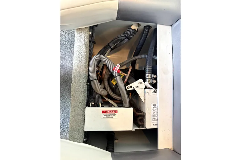 Slide: The Image of Engine compartment of a 2008 Formula 353 FASTech boat, showing wiring and components. - 19