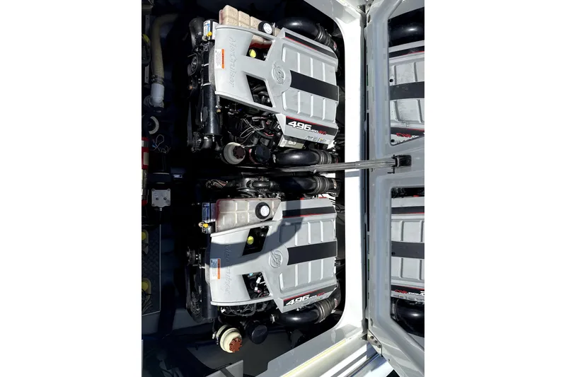 Slide: The Image of Twin engines in a 2008 Formula 353 FASTech boat, showcasing powerful performance. - 6