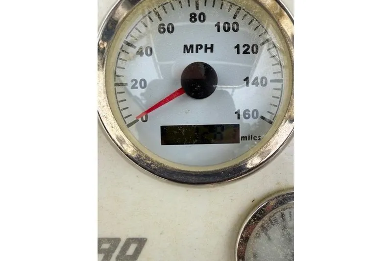 Slide: The Image of Speedometer of 2003 Sea Pro SV2100CC Bay Boat showing MPH and mileage. - 14