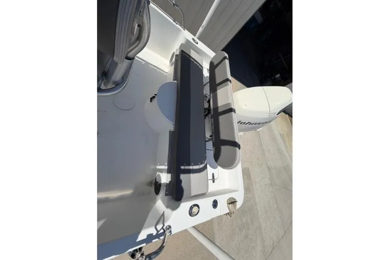 Slide: The Image of 2003 Sea Pro SV2100CC Bay Boat with Johnson outboard motor, viewed from above. - 9
