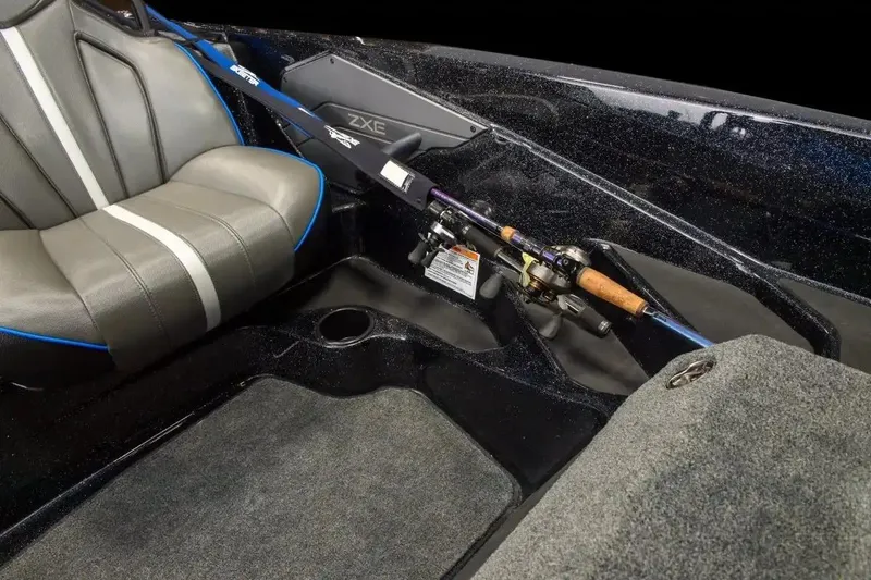 Slide: The Image of Manufacturer Provided Image: 2026 Skeeter ZXE20 boat interior with fishing rod holder and cushioned seat. - 17