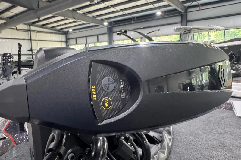 Slide: The Image of 2026 Skeeter ZXE20 boat motor in a showroom, featuring advanced pairing technology. - 5