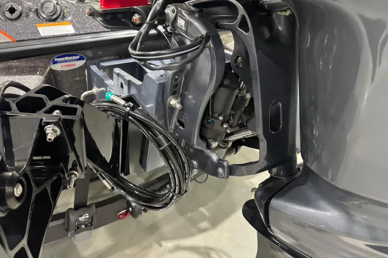 Slide: The Image of Close-up of 2026 Skeeter ZXE20 boat engine components and wiring. - 9