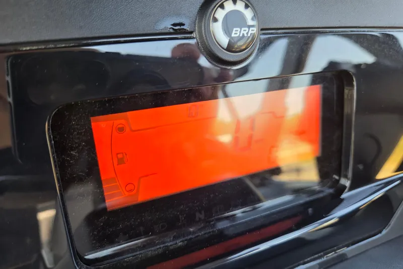 Slide: The Image of Dashboard display of 2024 Sea-Doo Switch Cruise 18 with BRP logo. - 9