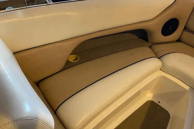 Slide: The Image of 2001 Malibu Sunscape 25 LSV interior seating with beige and white upholstery. - 15