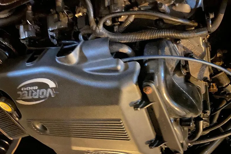 Slide: The Image of Engine of 2001 Malibu Sunscape 25 LSV boat, featuring Vortec 8100 components. - 25