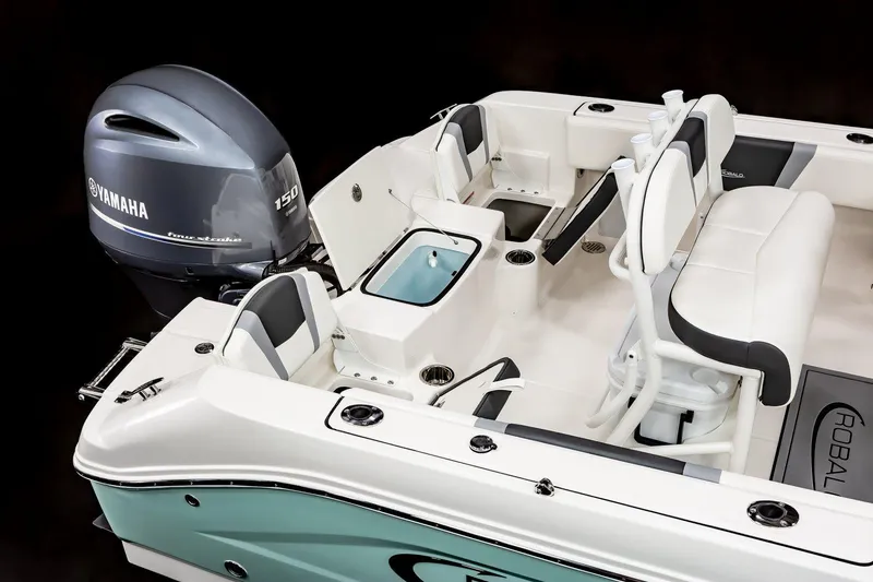 Slide: The Image of Manufacturer Provided Image: 2025 Robalo R180 Center Console boat interior with steering wheel and seating. - 10