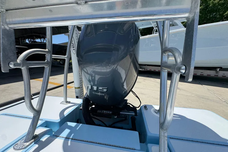 Slide: The Image of 2016 Hell's Bay Marquesa boat with Yamaha 115 engine at dockside. - 36