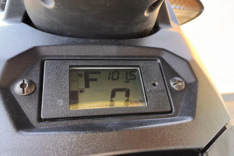 Slide: The Image of Dashboard of 2021 Yamaha WaveRunner EX Deluxe showing fuel and speed indicators. - 2