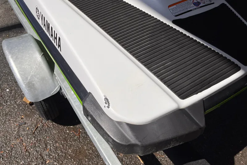 Slide: The Image of 2021 Yamaha WaveRunner EX Deluxe on trailer, showing rear deck and logo. - 7