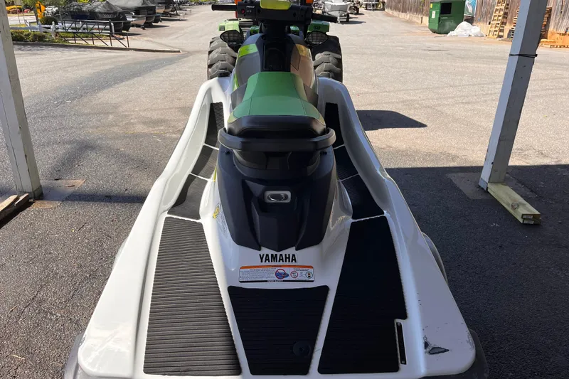 Slide: The Image of 2021 Yamaha WaveRunner EX Deluxe parked on pavement, rear view. - 8