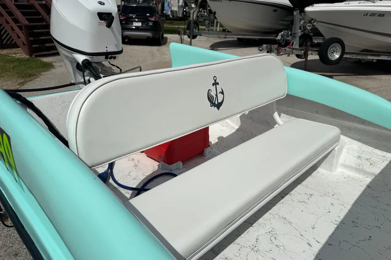Slide: The Image of 1959 Redfish 14 Shark boat interior with anchor-themed bench seat. - 8