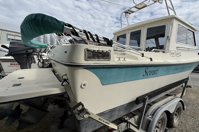 Slide: The Image of 1993 SeaSport Sportsman 22 boat on trailer, side view. - 10